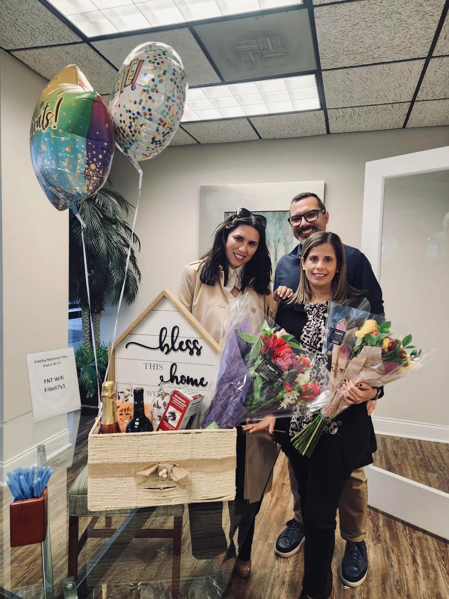 Closing celebration with clients and flowers
